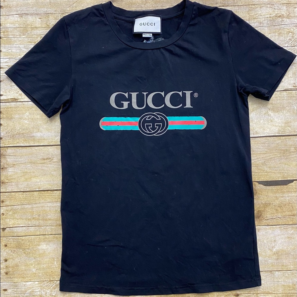 NWOT Oversize washed T-shirt with Gucci logo flower on the back